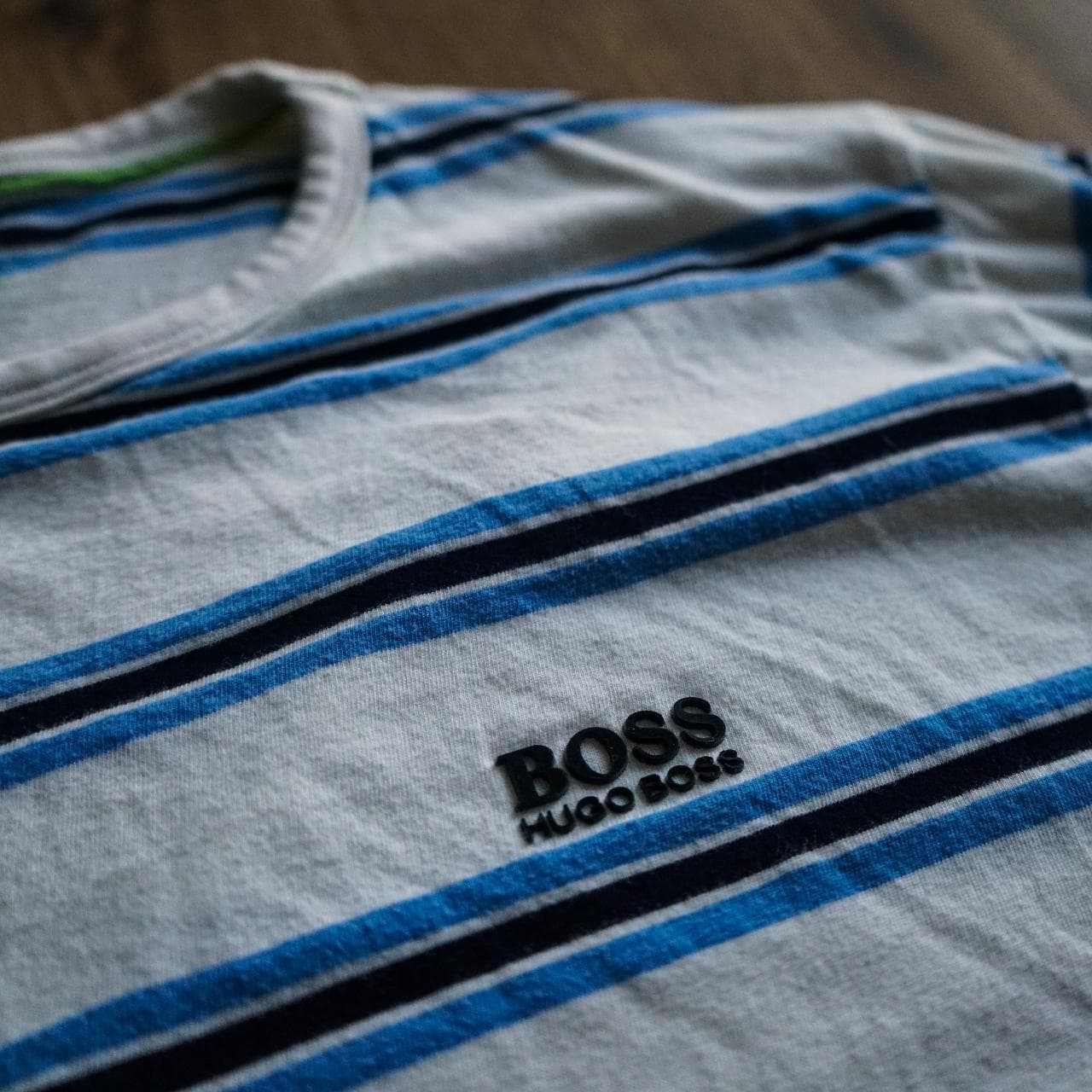 Blue striped #HugoBoss shirt with a raised logo on front. Size XL, European slim fit.