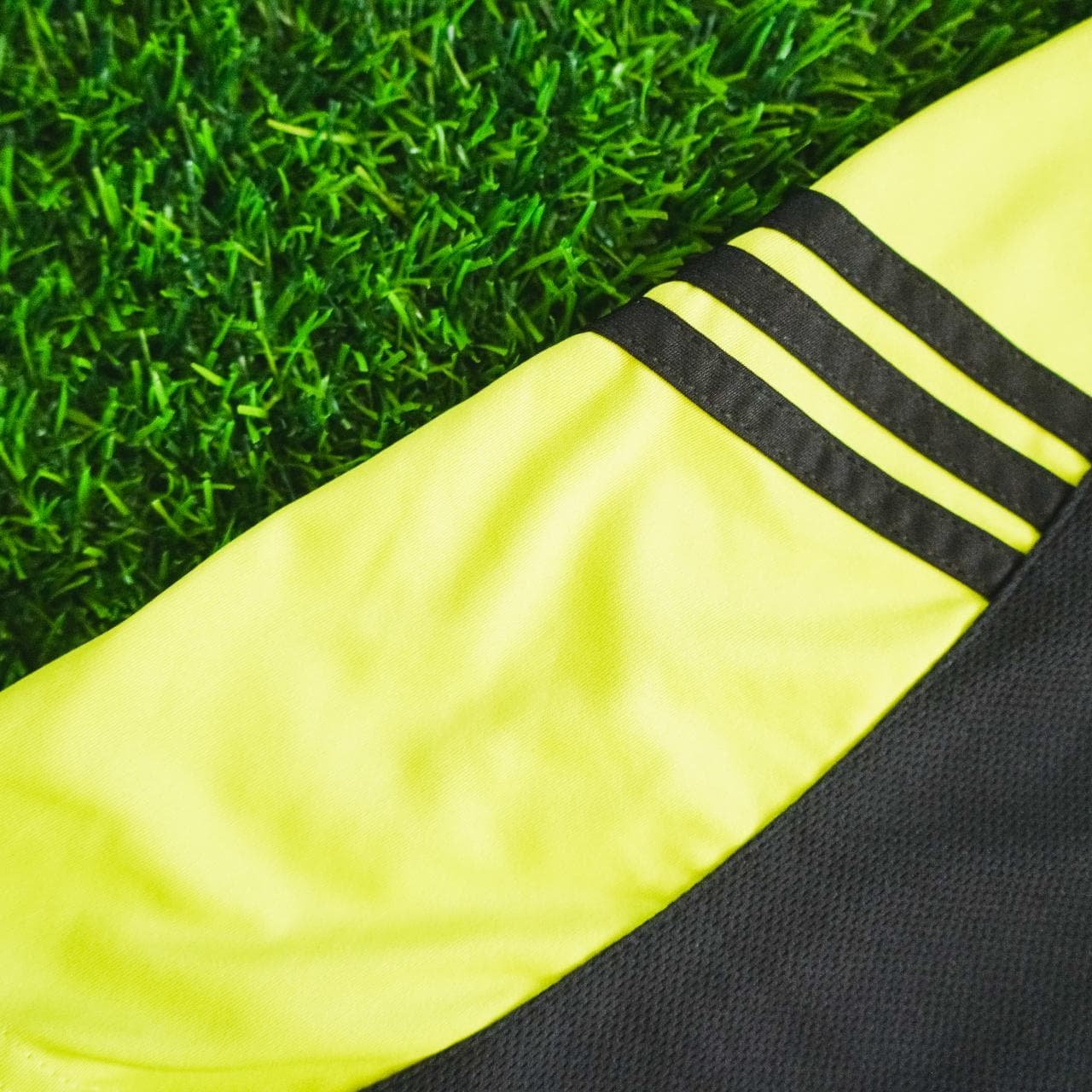 Highlighter #Adidas practice soccer jersey with black and grey accents. Features Adidas logo on the front and three stripes on sleeves. Kid's XL, fits like an adult small ⚽️ - Thumbnail 3