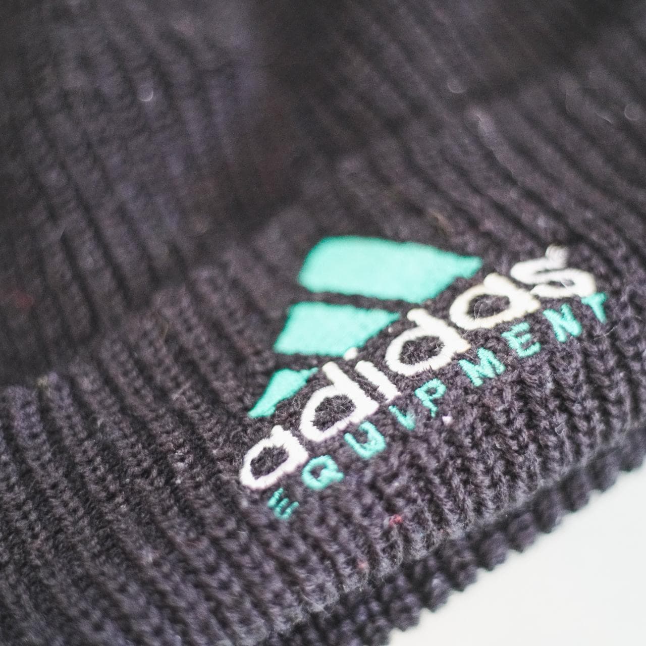 Vintage #Adidas jumbo rib beanie with embroidered three stripes logo and text. Beanie is black, green, and white. Decent condition, super soft to the touch. Shows signs of vintage aging 🧃 - Thumbnail 2