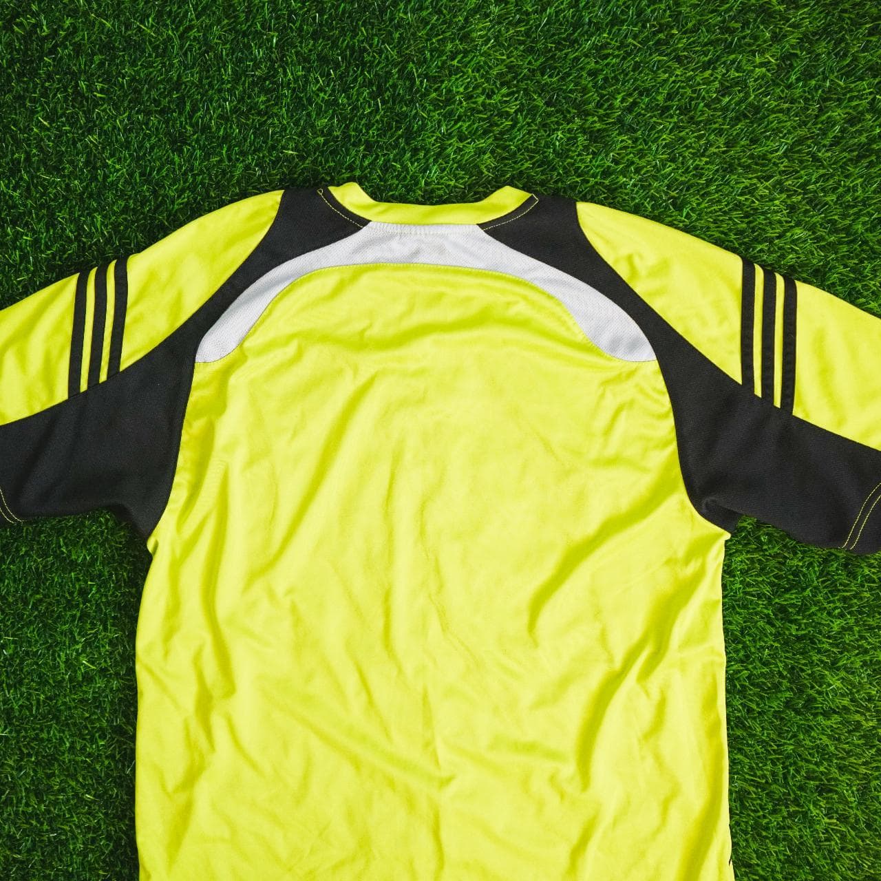 Highlighter #Adidas practice soccer jersey with black and grey accents. Features Adidas logo on the front and three stripes on sleeves. Kid's XL, fits like an adult small ⚽️ - Thumbnail 4