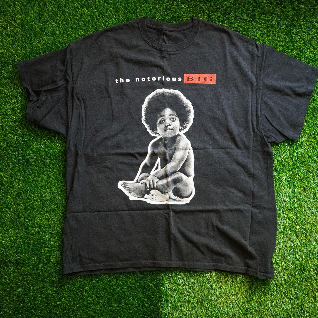 The Notorious BIG rap tee in size 2XL. Features color graphic on the front, blank back 🎙️