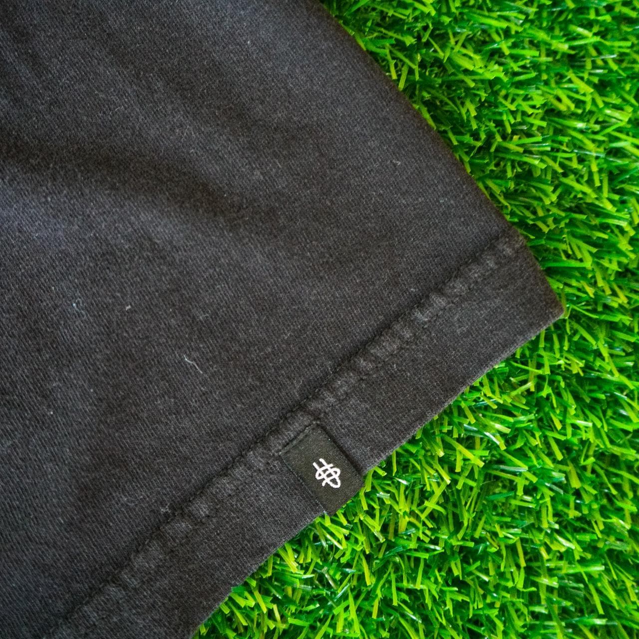 Fortune logo tee in black and white. Features logo on front and logo tag on sleeve, blank back. Adult size Medium 🦴 - Thumbnail 3