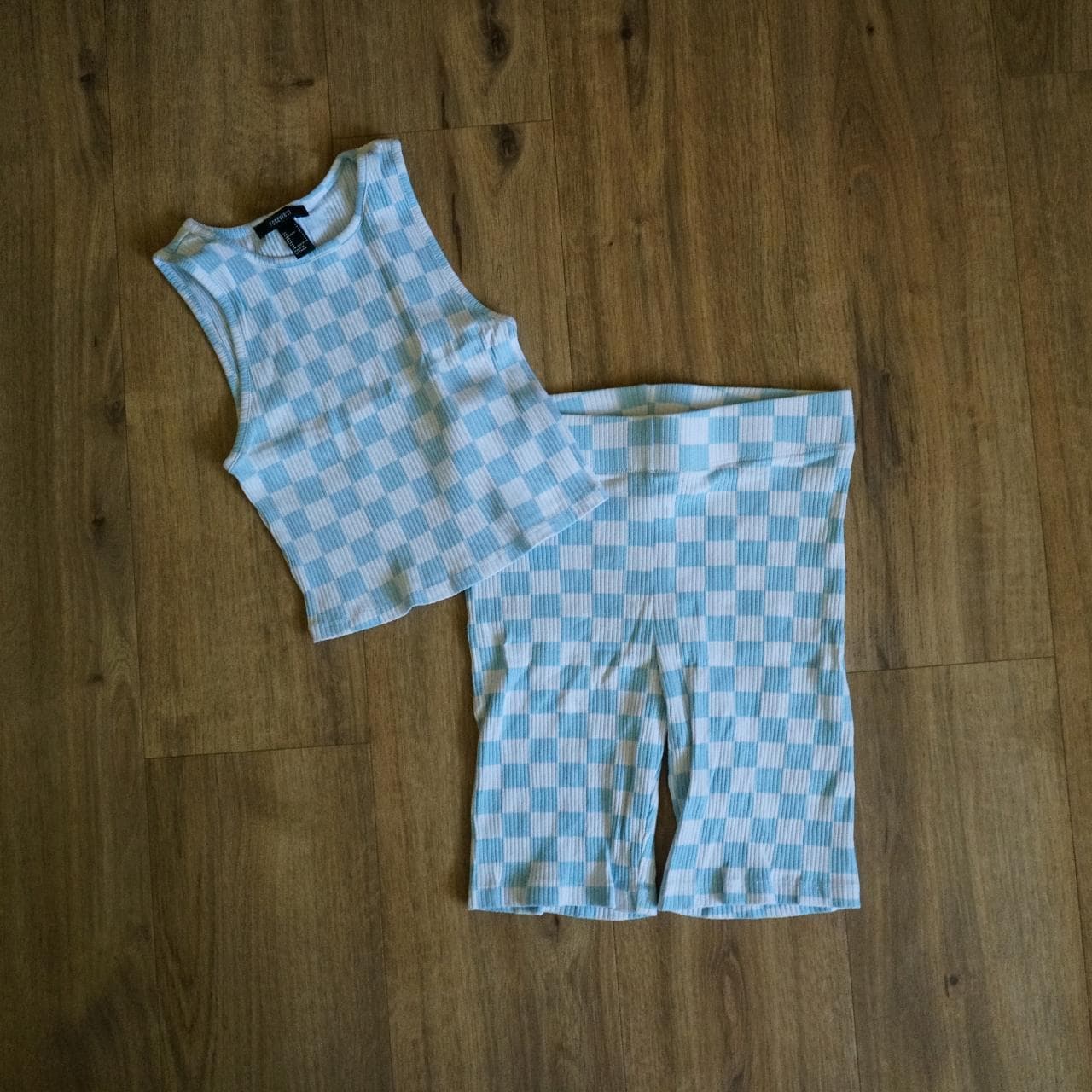 Baby blue and white checkered set with crop top and matching riding shorts. Like new W/OT. Women's size small 🥶