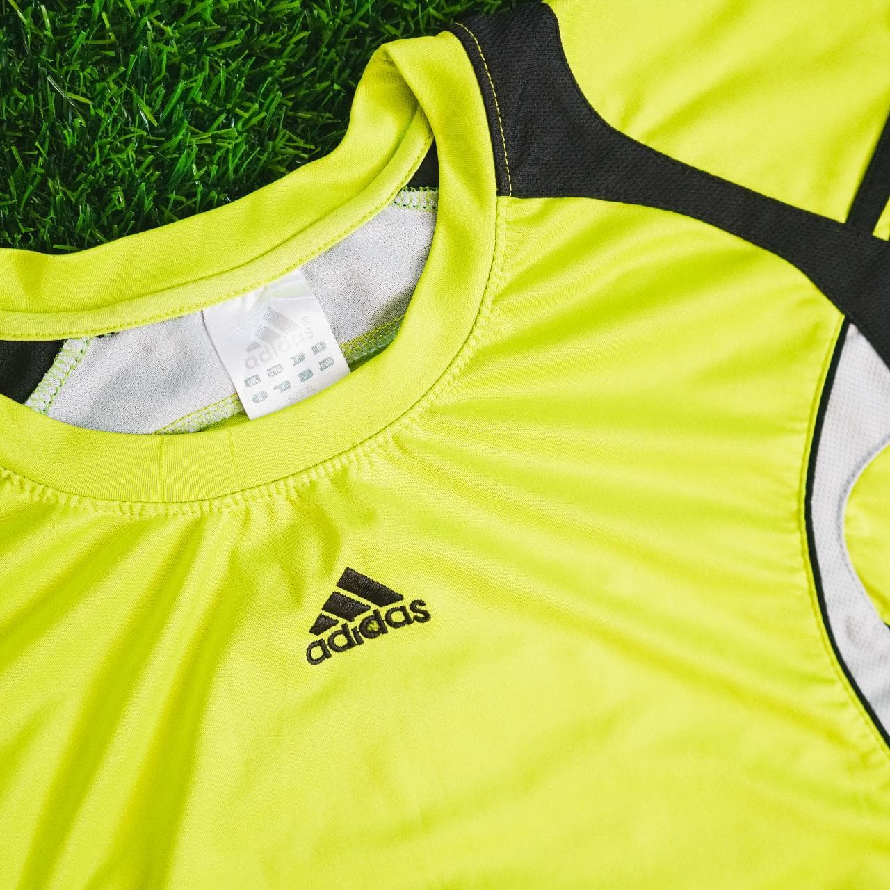 Highlighter #Adidas practice soccer jersey with black and grey accents. Features Adidas logo on the front and three stripes on sleeves. Kid's XL, fits like an adult small ⚽️ - Thumbnail 2