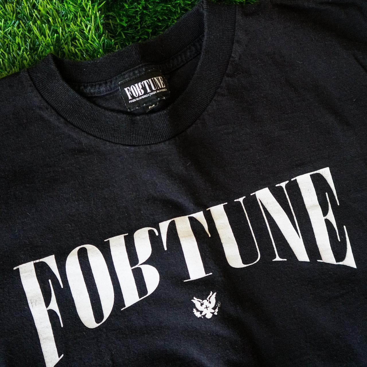 Fortune logo tee in black and white. Features logo on front and logo tag on sleeve, blank back. Adult size Medium 🦴
