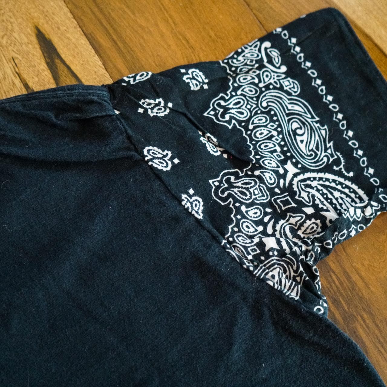 Black hand-sewn bandana tee in an adult medium. Bandana sleeves feature an all-over print. - Thumbnail 2