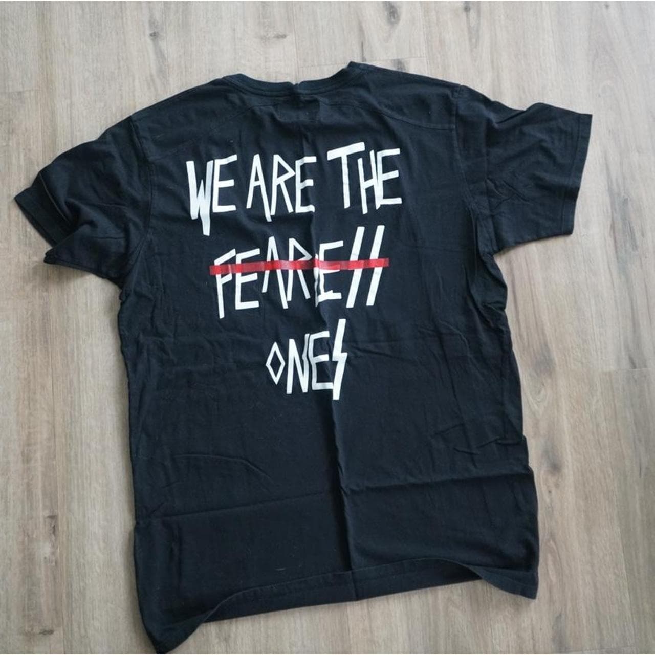 "We are the fearless ones" long line tee. Size Large. Graphics on front and back.