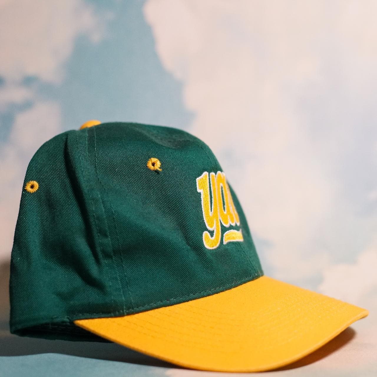 Green and yellow vintage snapback with "yac" on front. Features yellow under brim and adjustable snapback closure 🧢 - Thumbnail 2