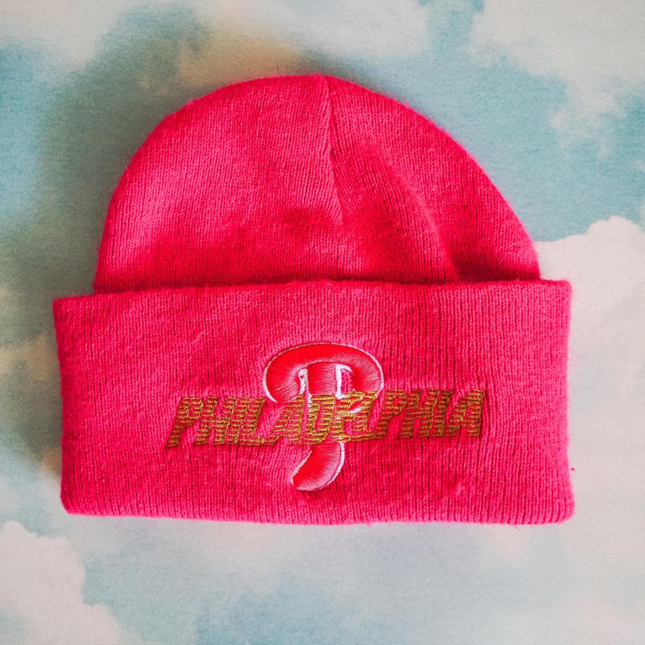 Philadelphia Phillies #MLB beanie in hot pink. The hat features Phillies team logo embroidered on one side. Great condition with gold accents. One size fits all.