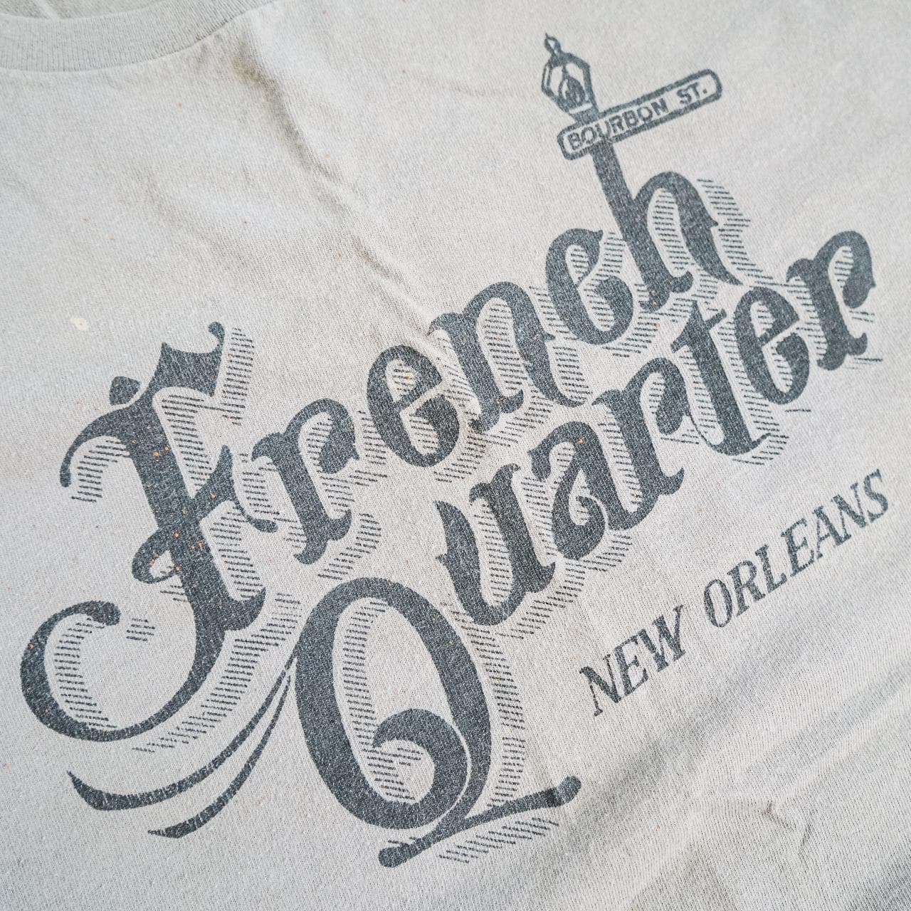Vintage #CalvinKlein "French Quarter" tee in flat gray. Features graphic on front and small distressed graphic on the back. Size adult large, oversized fit 🍸 - Thumbnail 2