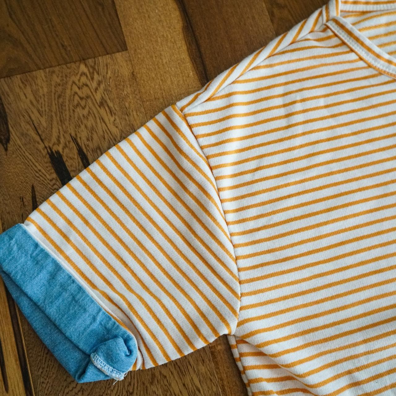 Chambray and striped oversized cropped shirt in yellow and white. One size fits all 🐠