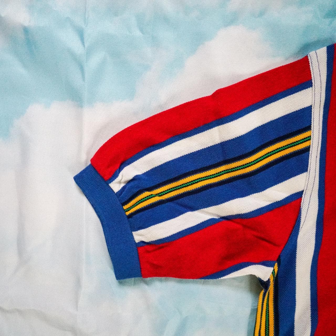 Lord and Taylor striped polo in top condition. Stripes feature blue, red, yellow and white. Size men's small 👕 - Thumbnail 2