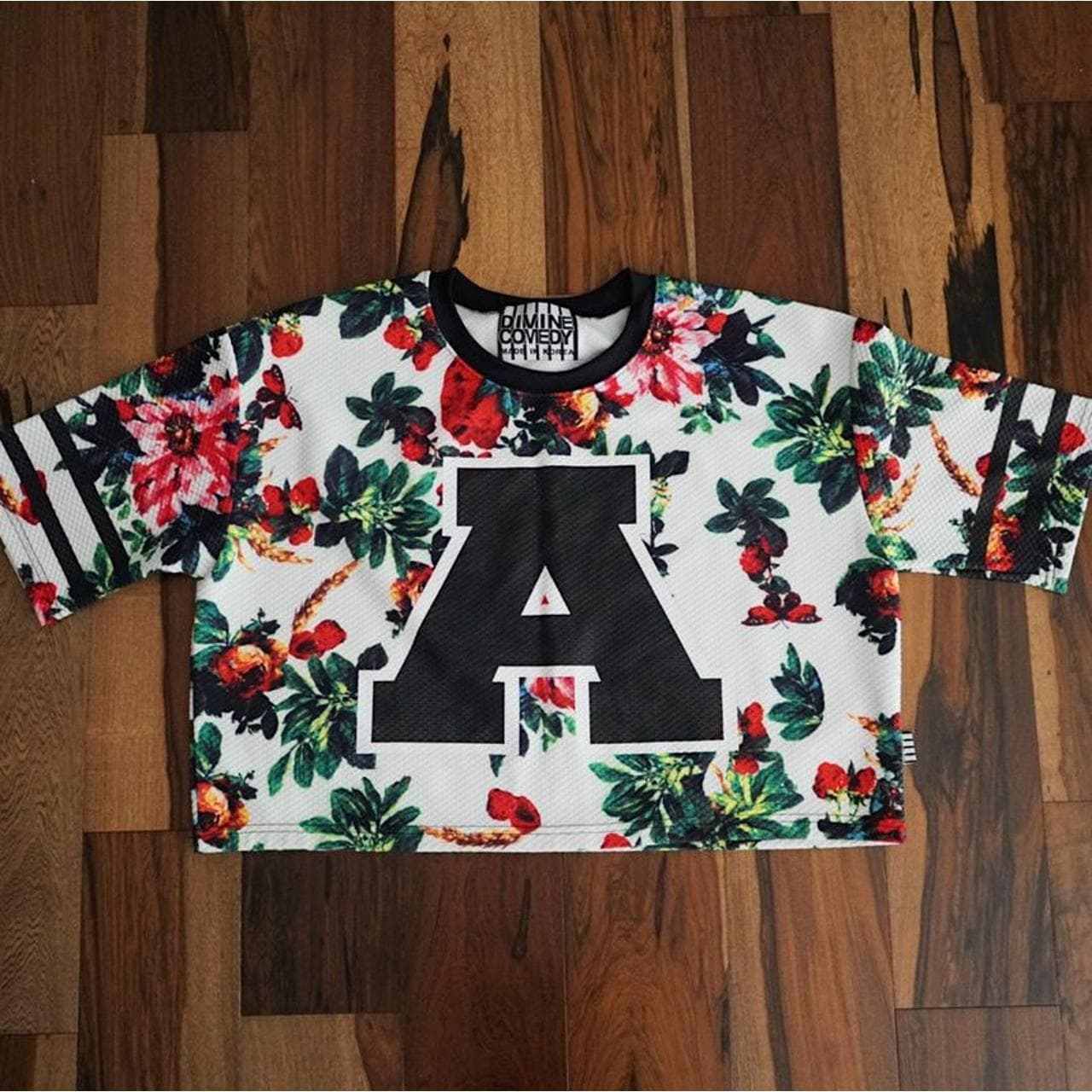 Korean streetwear jersey. One size fits all, A print on front with stripes on sleeves. Heavyweight knit material.