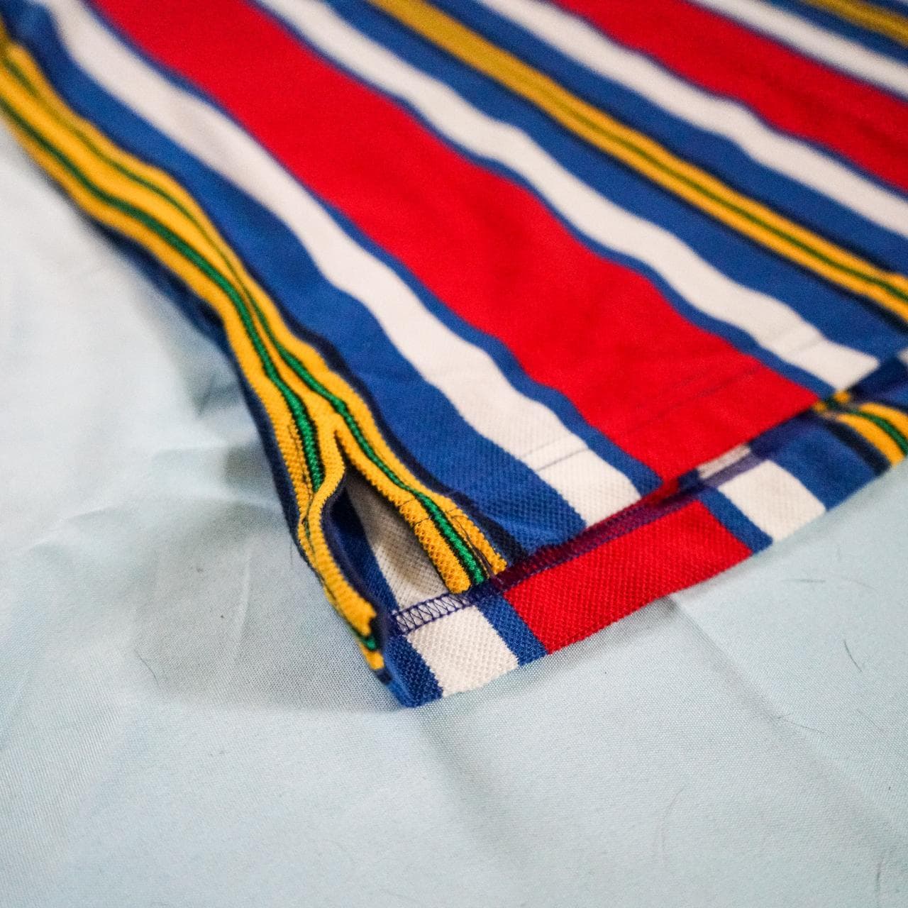 Lord and Taylor striped polo in top condition. Stripes feature blue, red, yellow and white. Size men's small 👕 - Thumbnail 4