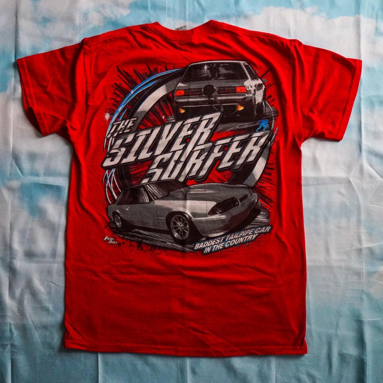 Silver Surfer street racing tee in red with black, blue, and silver accents. Features full-color graphics on the front and back 🏎 Adult size large. - Thumbnail 3