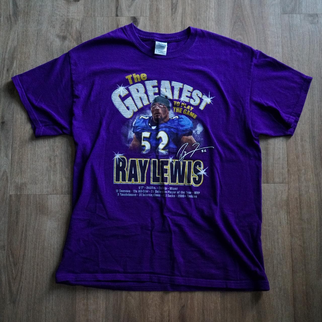 Ray Lewis #Baltimore Ravens #NFL tee in purple and gold 🏈 Features full-color graphic on front. Size adult Large.