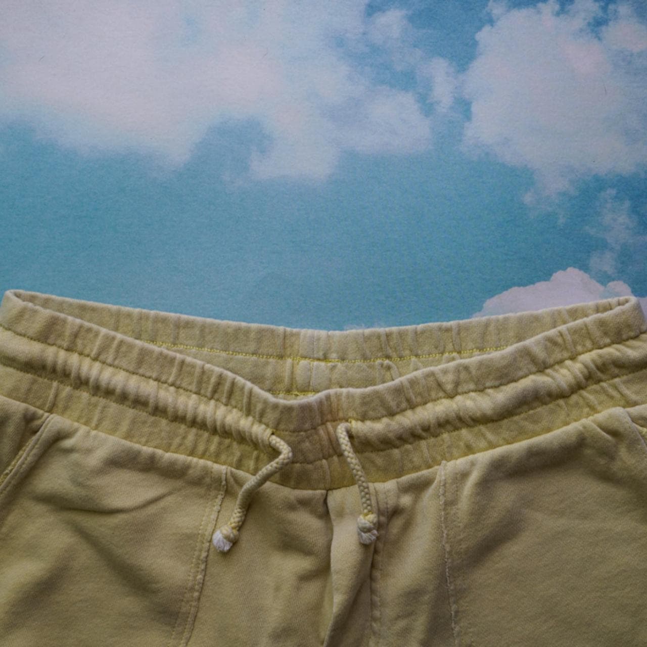 Yellow sweat shorts in size adult small. Elastic waistband with drawstring and pockets on both the front and back. - Thumbnail 3