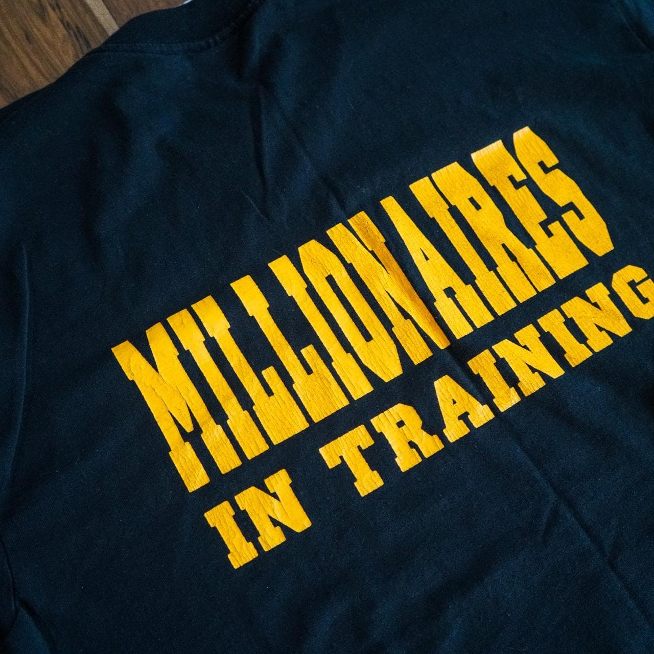 S.W.A.T. Millionaires in Training vintage tee in black with yellow text graphics on the front and back 💰 Small bleach discoloration on front. - Thumbnail 4