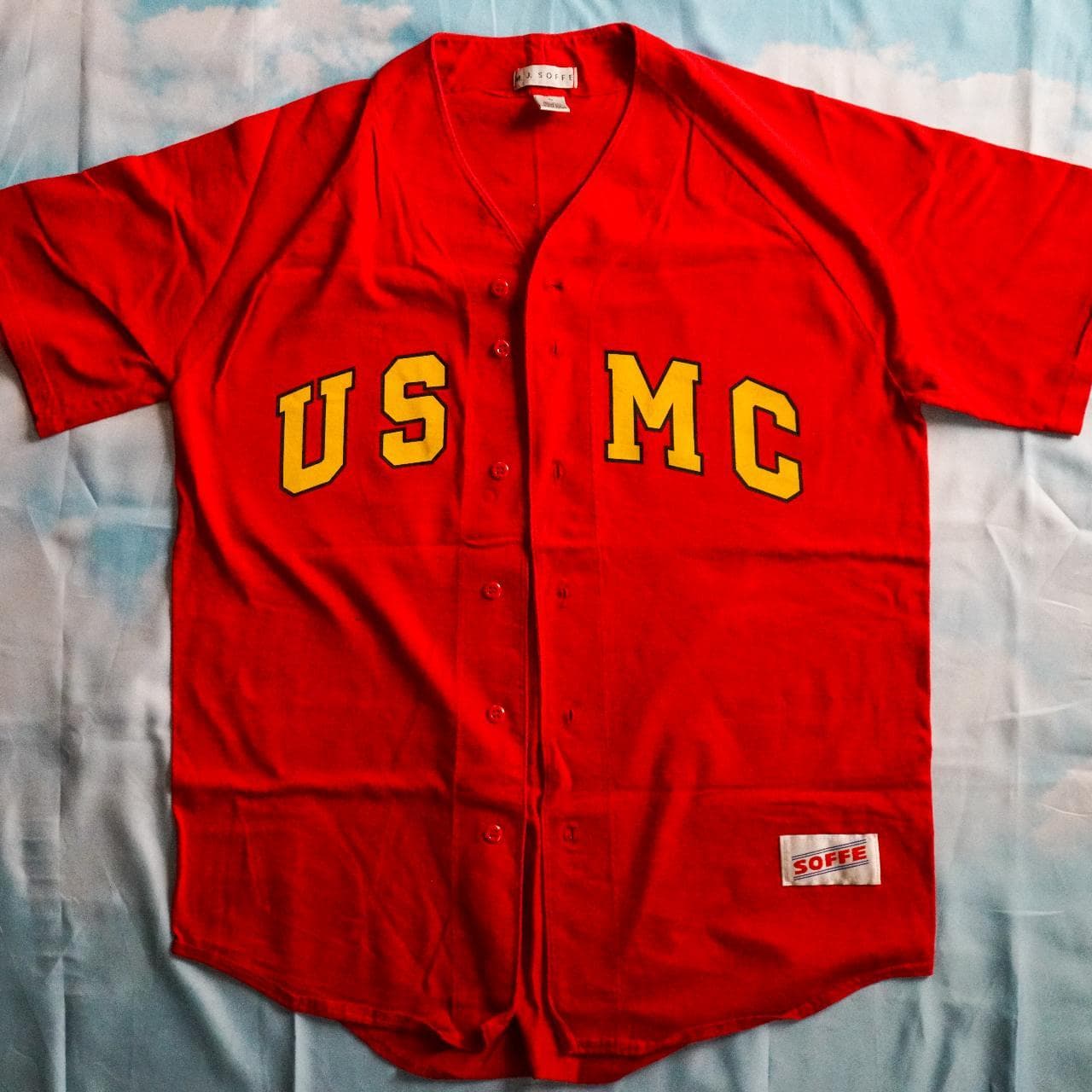 US Marine Corps #USMC baseball jersey in red and yellow. Features screenprint on the front, Soffe patch, and button closure ⚾️