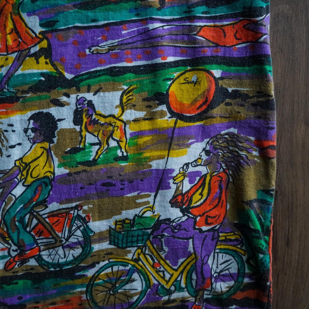 Vintage all-over print tee in vibrant multi-color. The shirt depicts a tropical beach scene. Size adult medium. - Thumbnail 3
