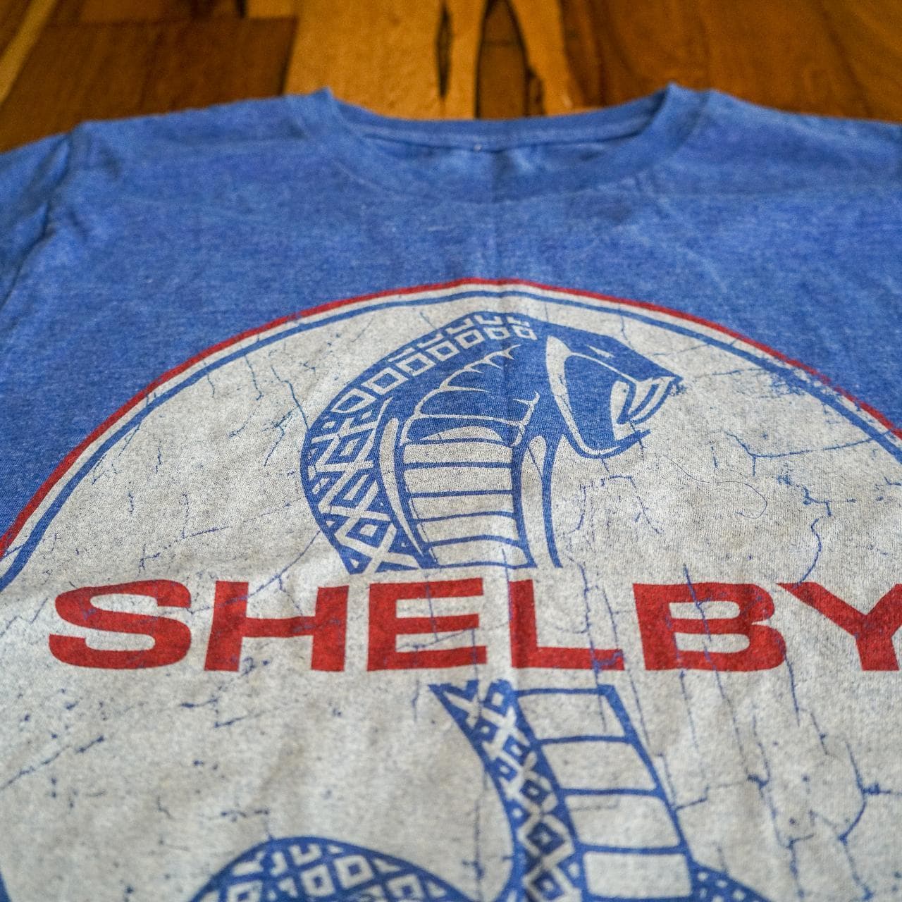 Shelby #Mustang tee in royal, white, and red. Graphic on the front with an asymmetrical bottom. - Thumbnail 2