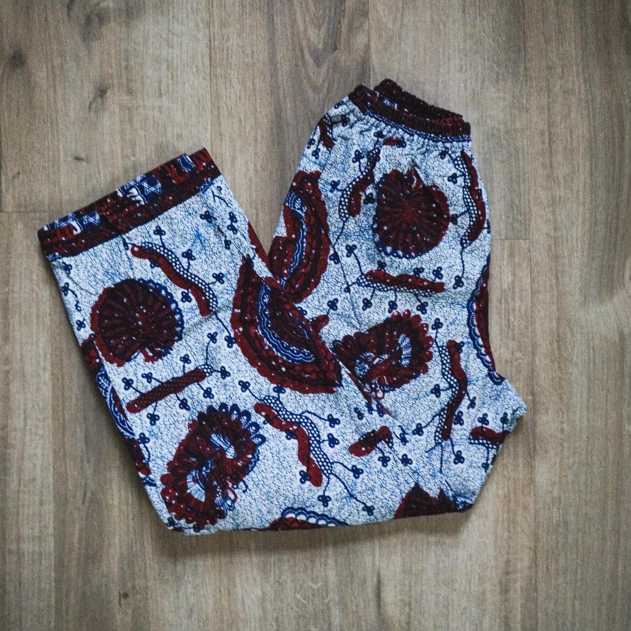 Authentic #kente cloth pants with elastic waist and pockets. Adult size medium in navy, white, and deep red 👖