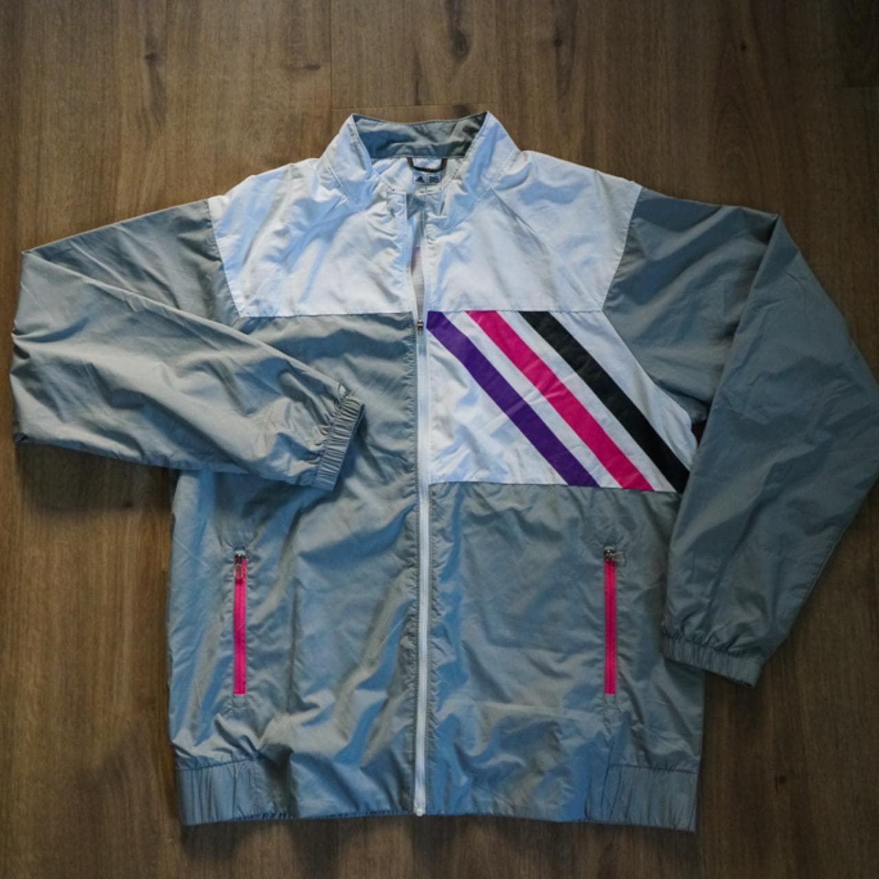 #Adidas #golf jacket in gray and white with pink & purple accents. Men's size large. Light weight zippered jacket with zippered pockets on the front.