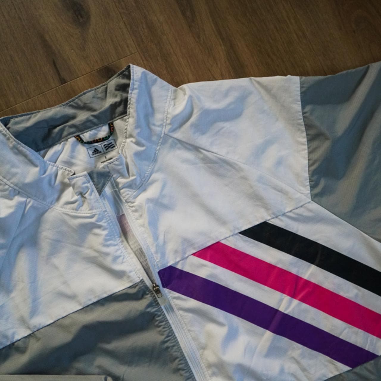 #Adidas #golf jacket in gray and white with pink & purple accents. Men's size large. Light weight zippered jacket with zippered pockets on the front. - Thumbnail 2