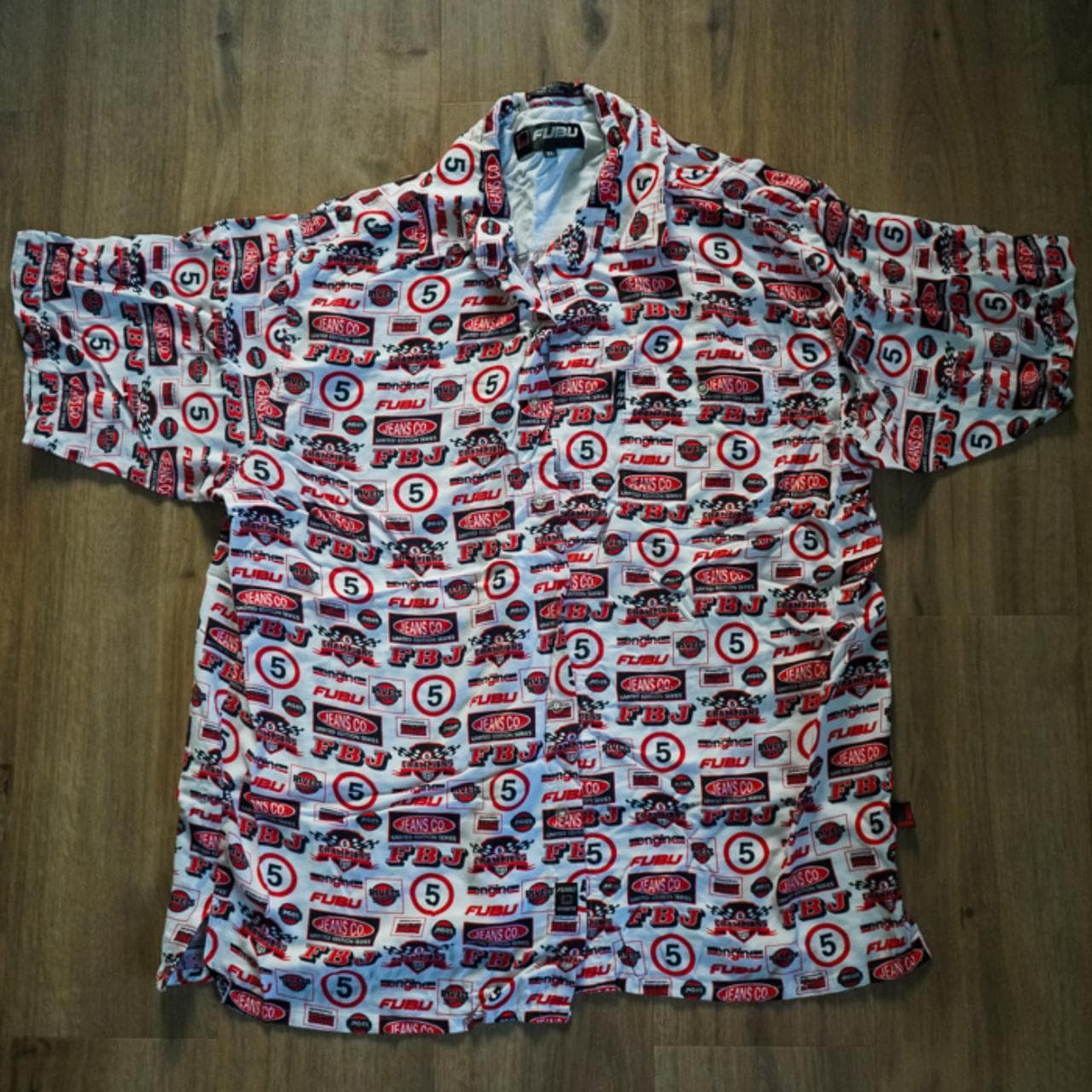 Vintage #FUBU short sleeved button up in Men's XL. All over print in red, white, and black. FUBU branding throughout. #90s #raptee
