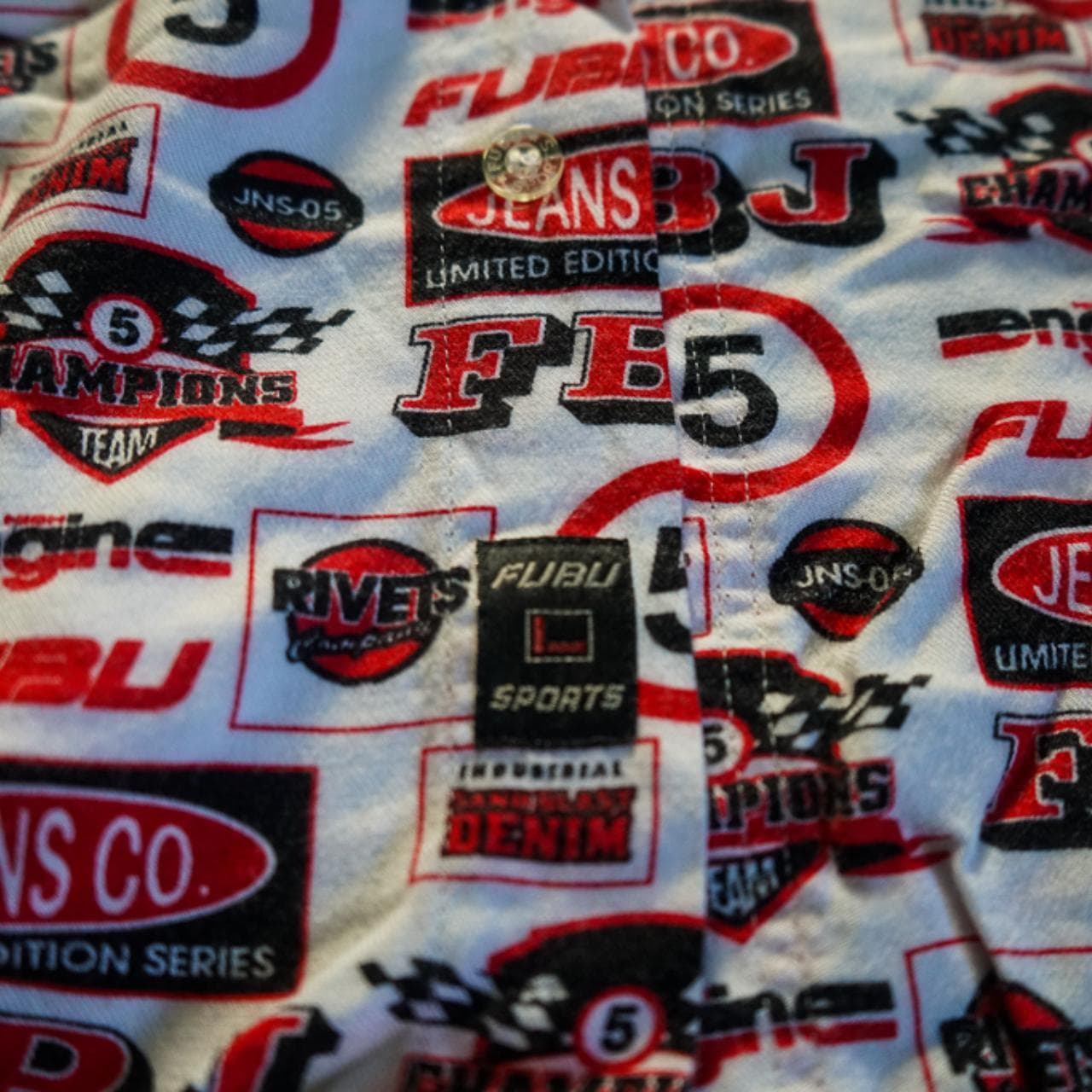 Vintage #FUBU short sleeved button up in Men's XL. All over print in red, white, and black. FUBU branding throughout. #90s #raptee - Thumbnail 4