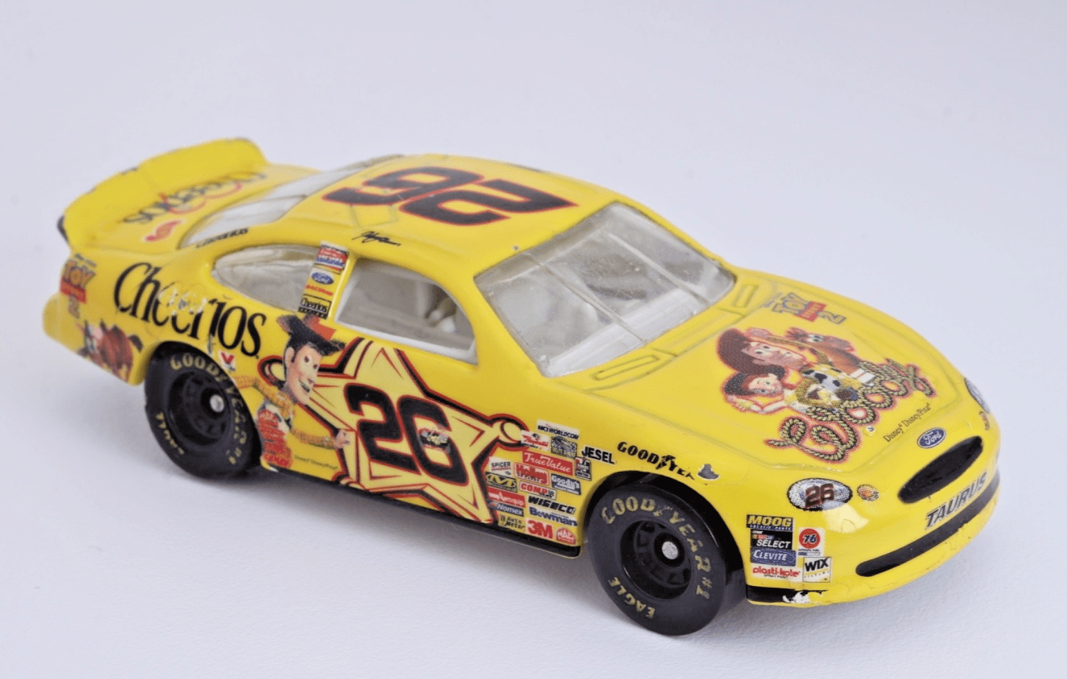 1999 Hot Wheels ~ NASCAR Johnny Benson #26 Cheerios Toy Story 2 FORD TAURUS 1/64