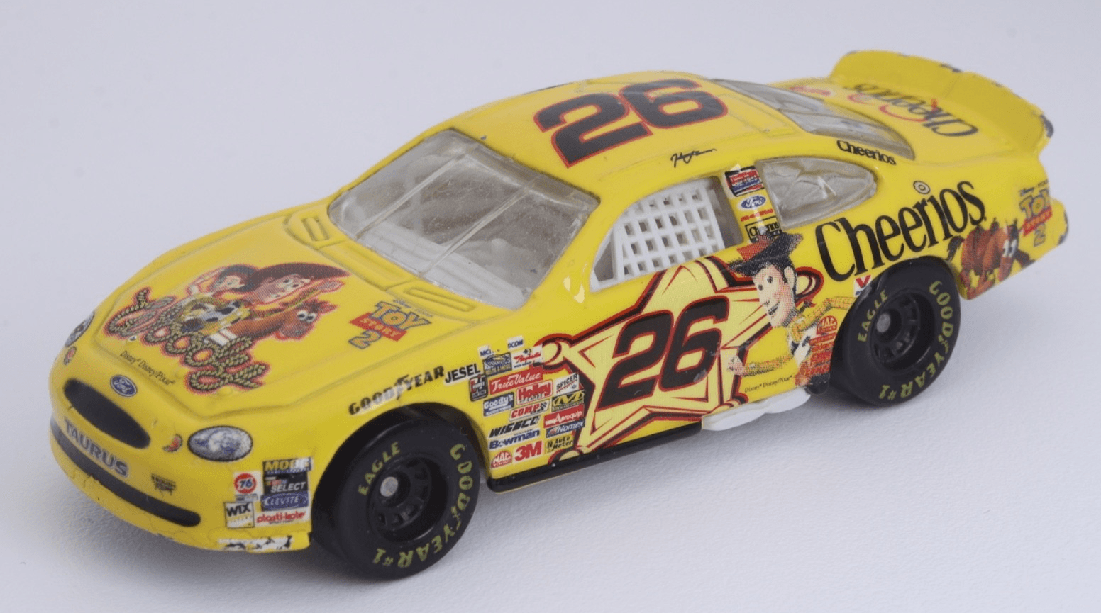 1999 Hot Wheels ~ NASCAR Johnny Benson #26 Cheerios Toy Story 2 FORD TAURUS 1/64 - Thumbnail 2