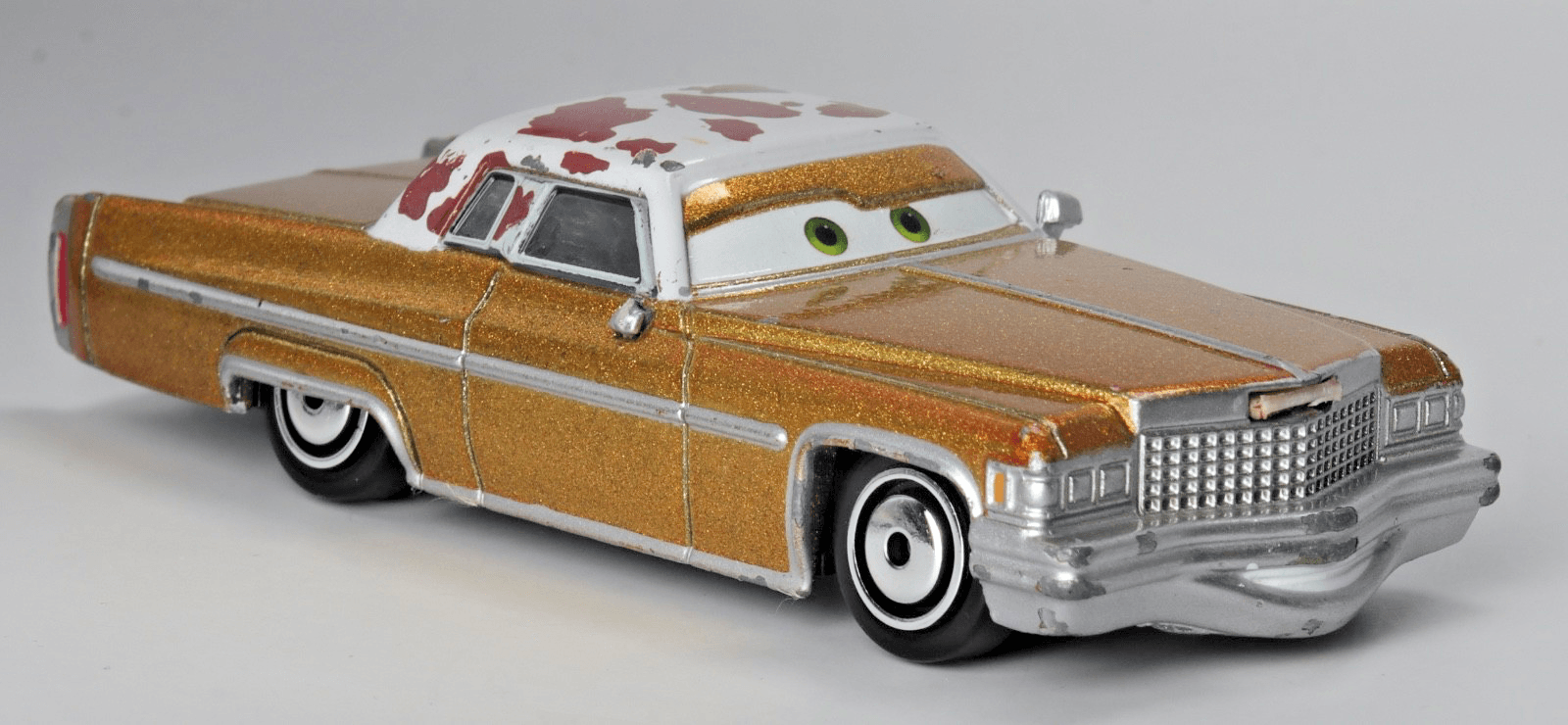Disney Pixar Cars ~ TEX DINOCO ~ Gold 1975 Cadillac Coupe DeVille Diecast 1:55