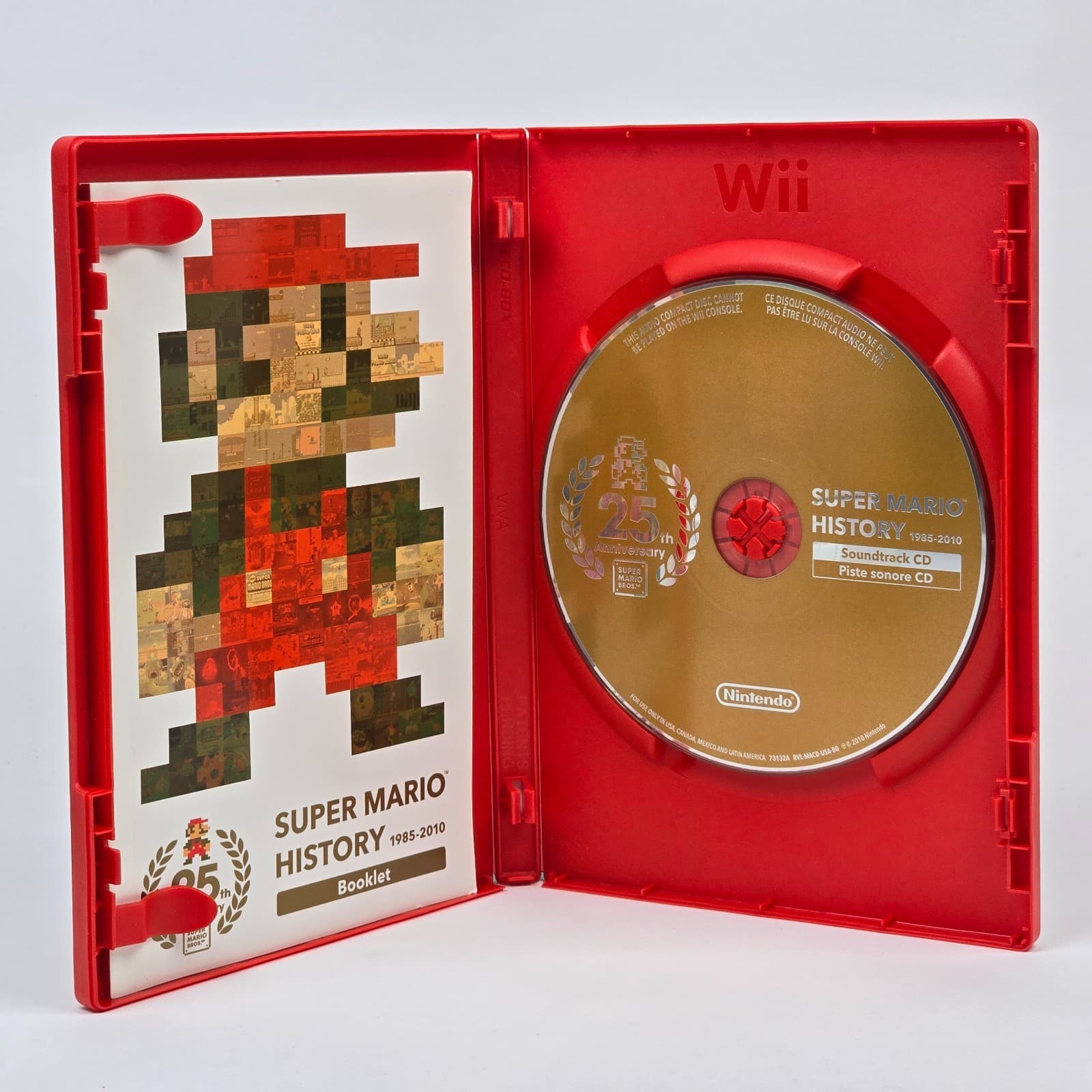 Super Mario History 1985-2010 Book and Soundtrack (Nintendo Wii) CIB COMPLETE - Thumbnail 2