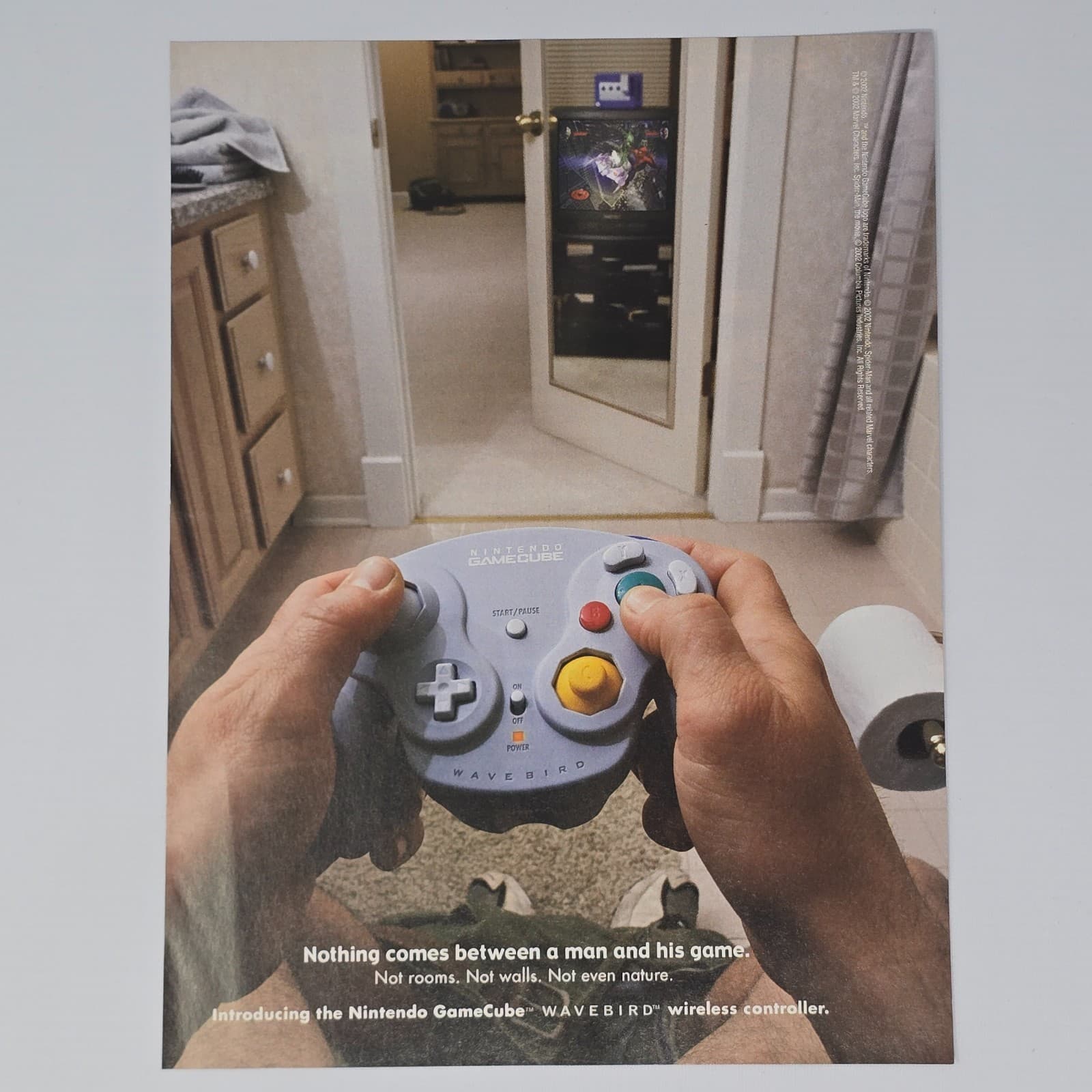 Nintendo GameCube Wave Bird Wireless Controller Between A Man Print Ad/Poster