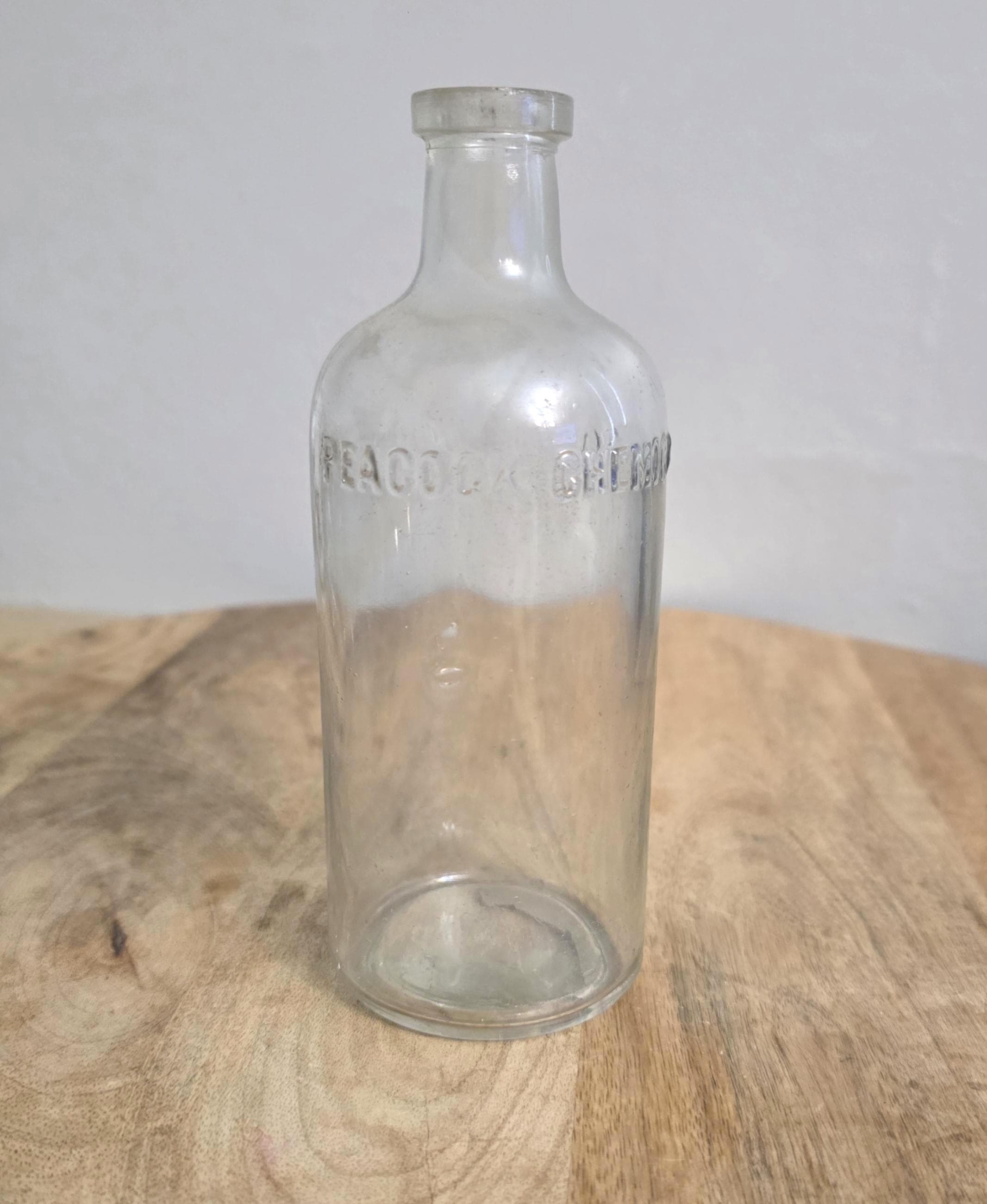 Vintage Peacock Chemical Glass Bottle