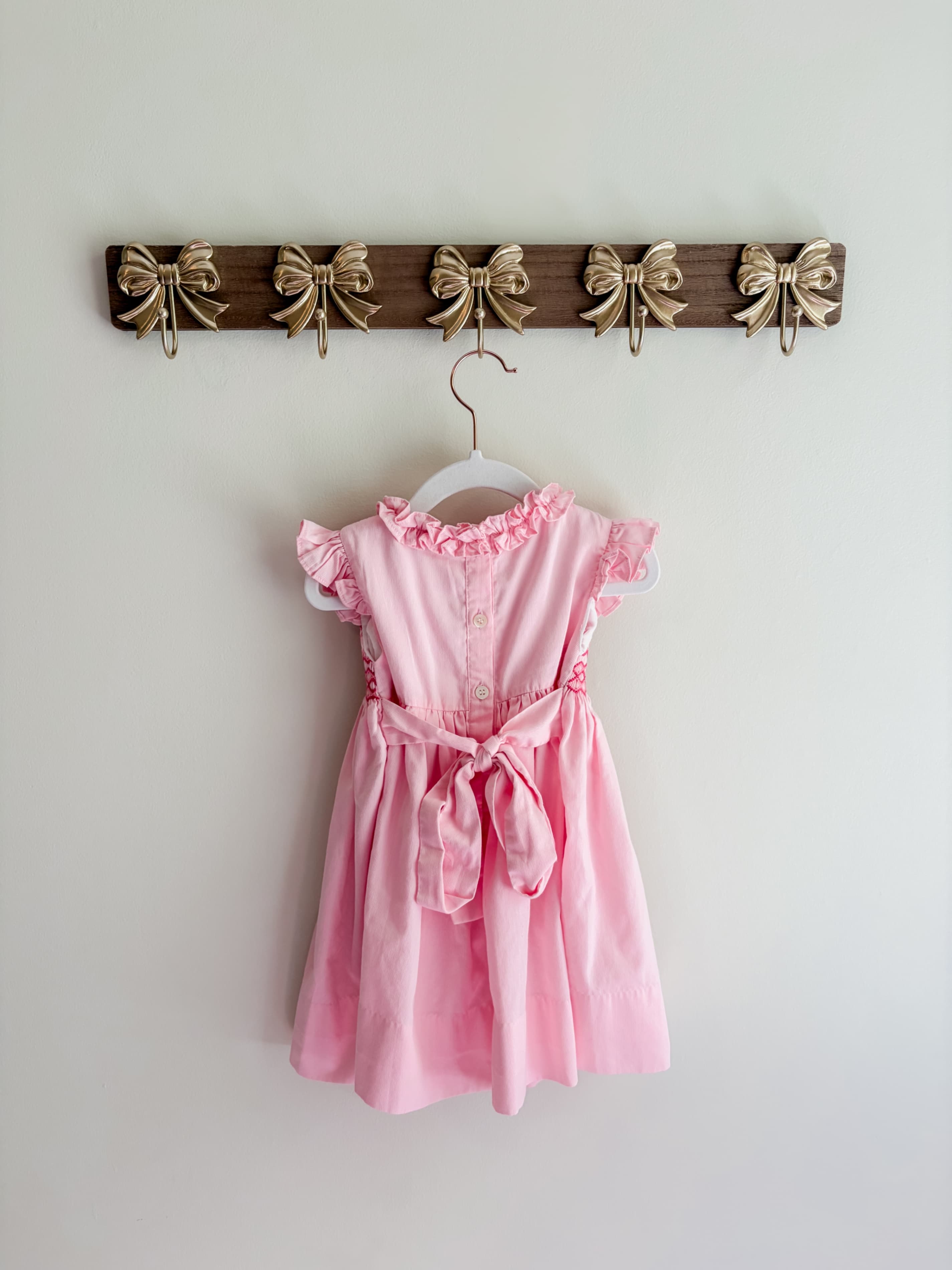 Cecil & Lou size 24 months Pink Smocked Dress with Ruffle Sleeves and Bow Back with slight stains pictured - Thumbnail 2