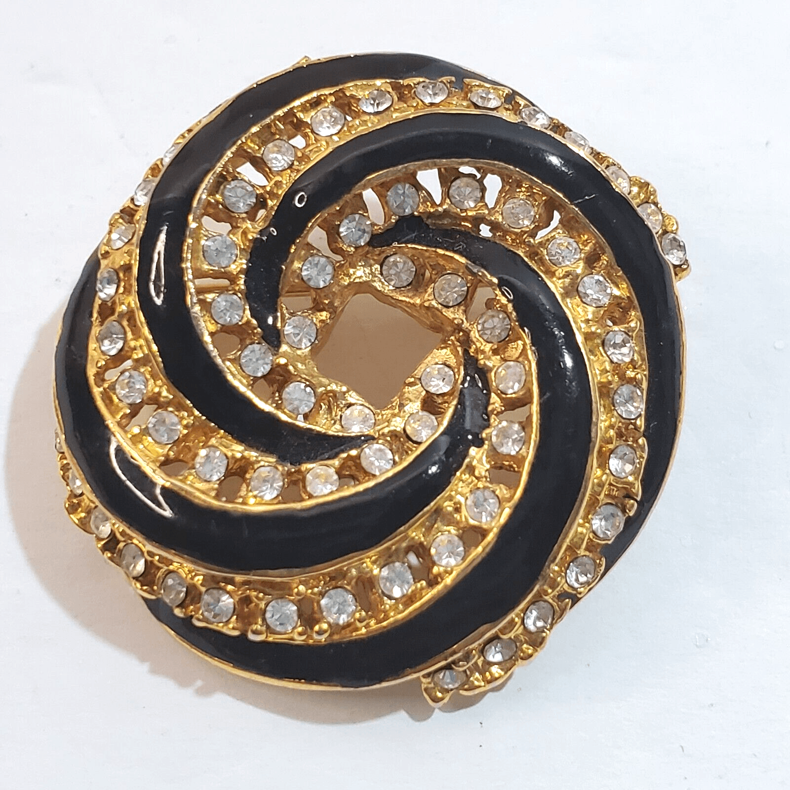 Vintage Gold Tone Black Enamel Clear Rhinestone Swirl Knot Circle Brooch Pin