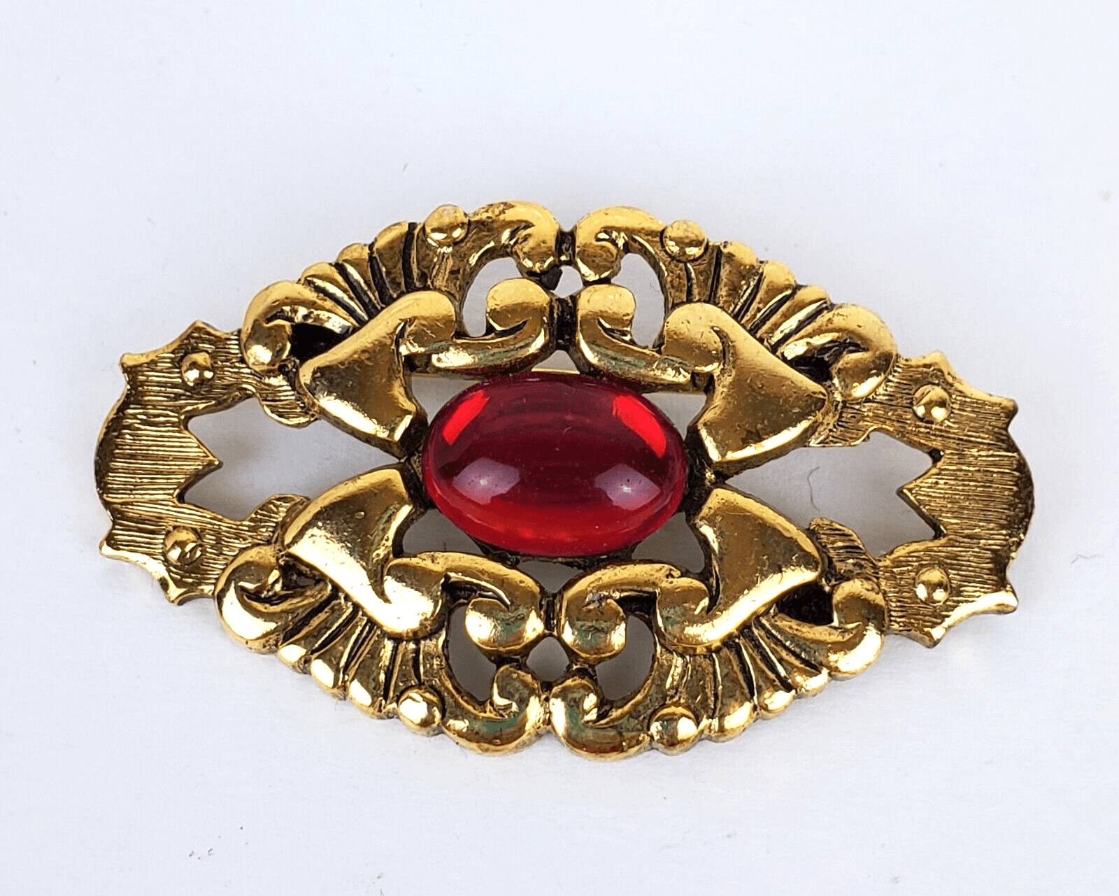 Vintage Ginnie Johansen Gold Tone Openwork Metal W/ Red Cabochon Brooch Pin