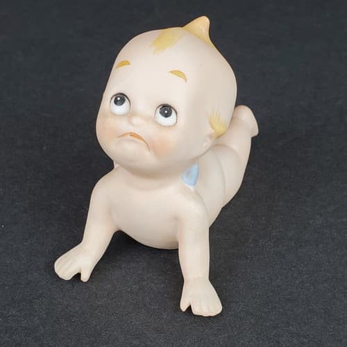 Vintage Made in Japan Kewpie Laying Tumbling Bisque Blue Wing Cherub Figurine