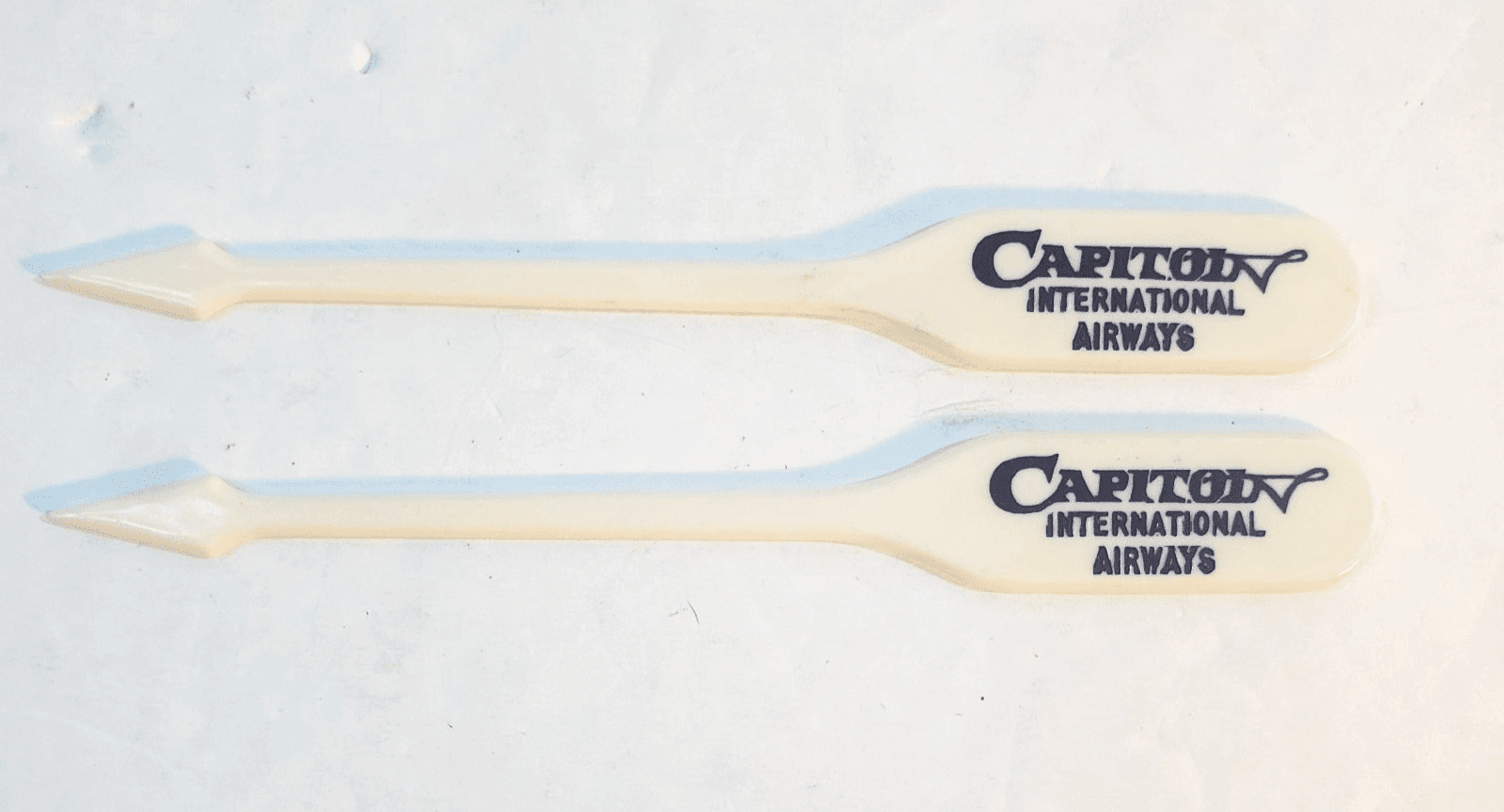 2 Vtg Capitol International Airways Swizzle Stick Airlines Martini Drink Skewer