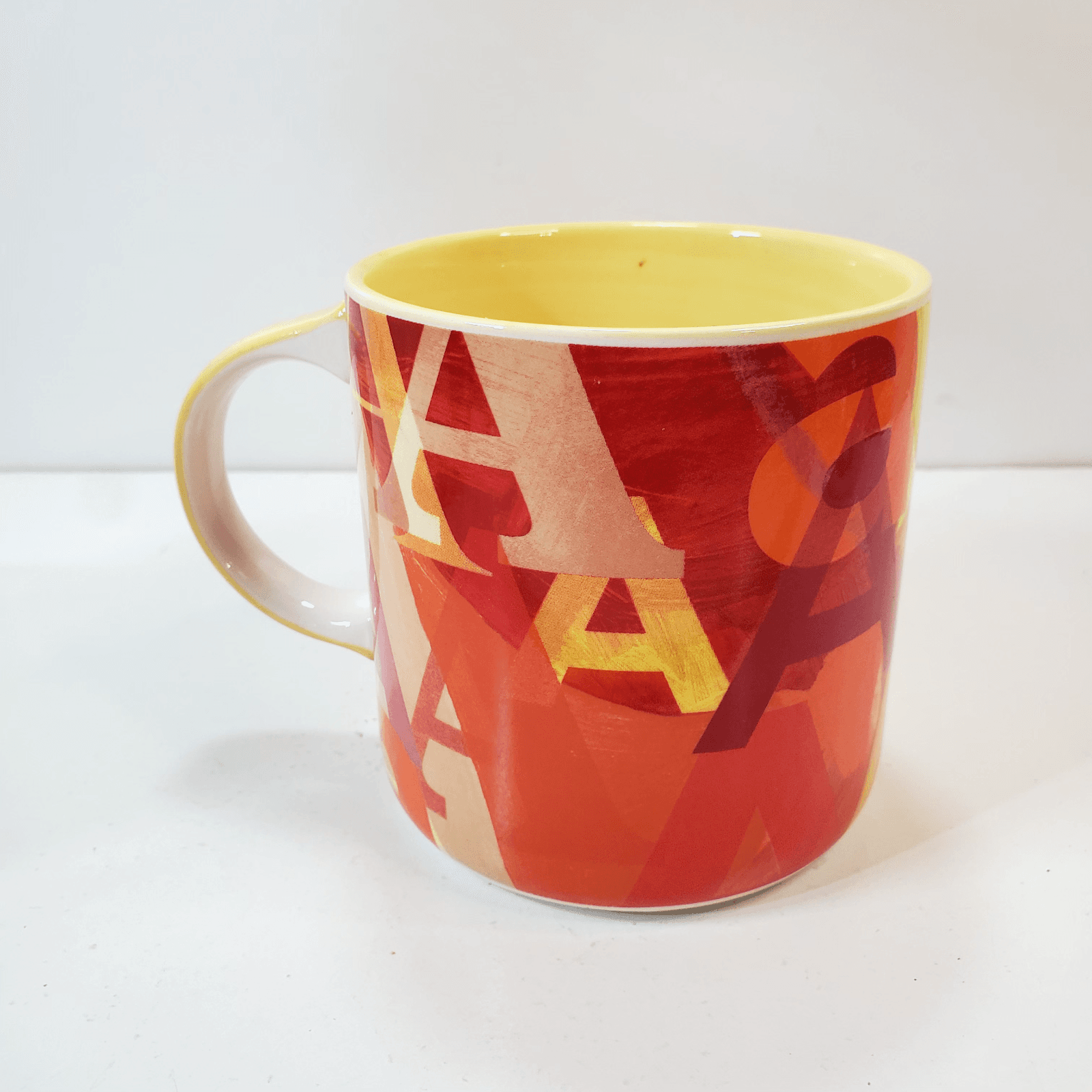Anthropologie Coffee Mug Cup Multicolored A's in Different Fonts Yellow Inside - Thumbnail 3