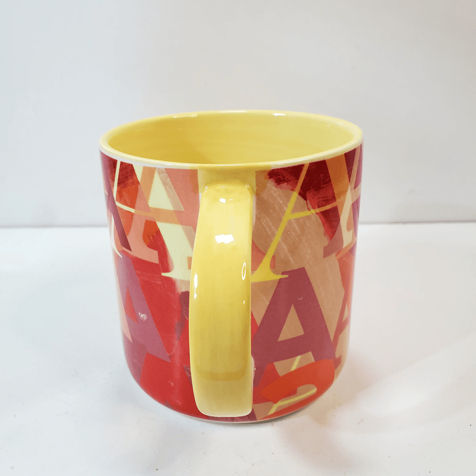 Anthropologie Coffee Mug Cup Multicolored A's in Different Fonts Yellow Inside - Thumbnail 4