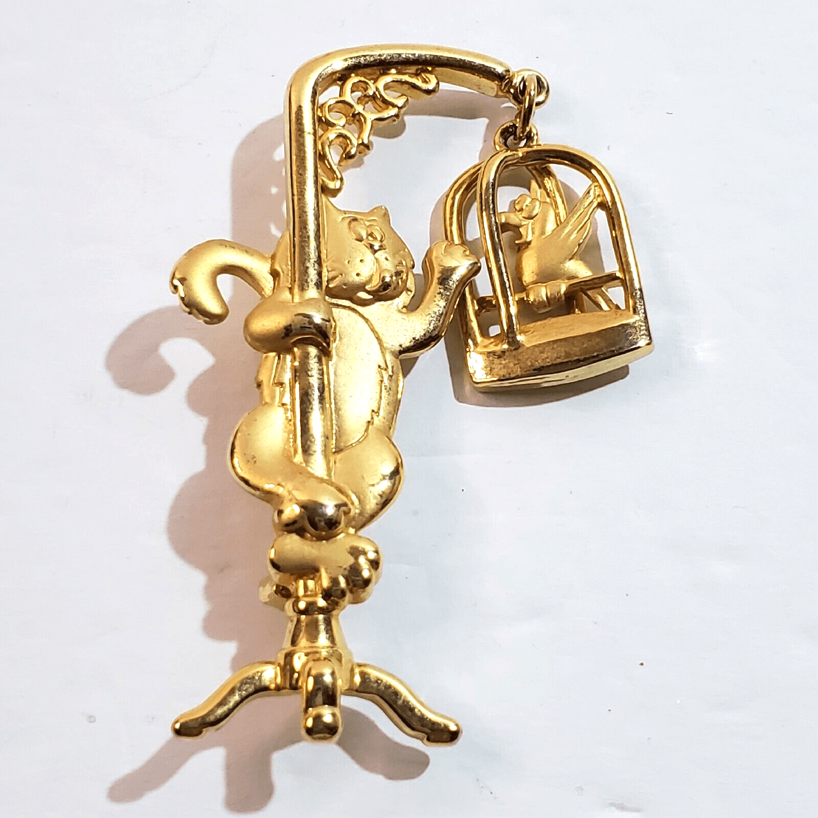 Vintage JJ Jonette Gold Tone Metal Cat Climbing on Birdcage Parrot Brooch Pin