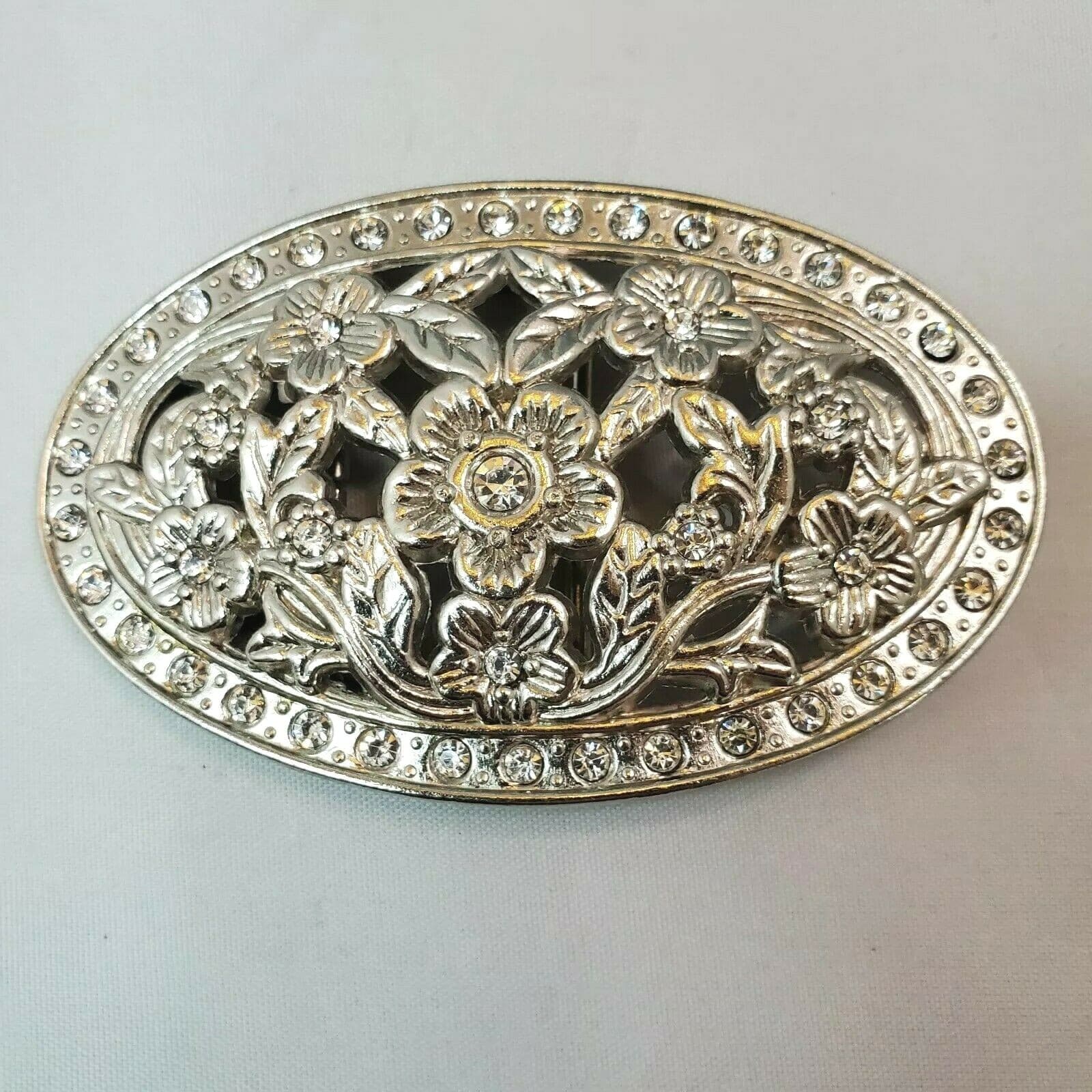 Oval Silver Tone Metalwork Belt Buckle Rhinestones Flowers Leaves Cutout Western