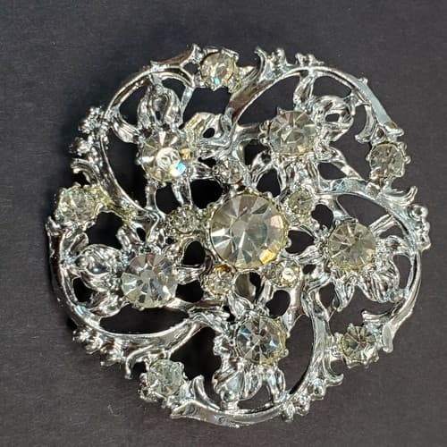 Vintage Silver Tone Clear Rhinestone Round Swirl Snowflake Open Work Pin Brooch