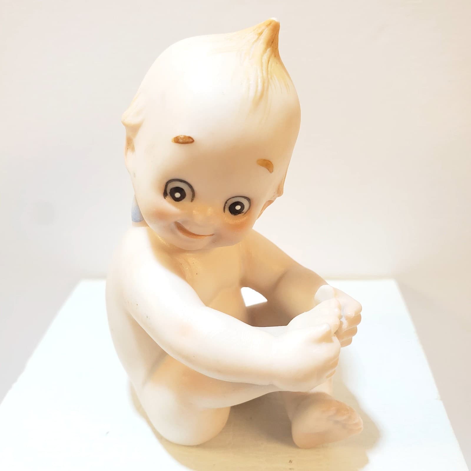 Vtg Kewpie Sitting Holding Foot Bisque Blue Wing Cherub Figurine Made In Japan