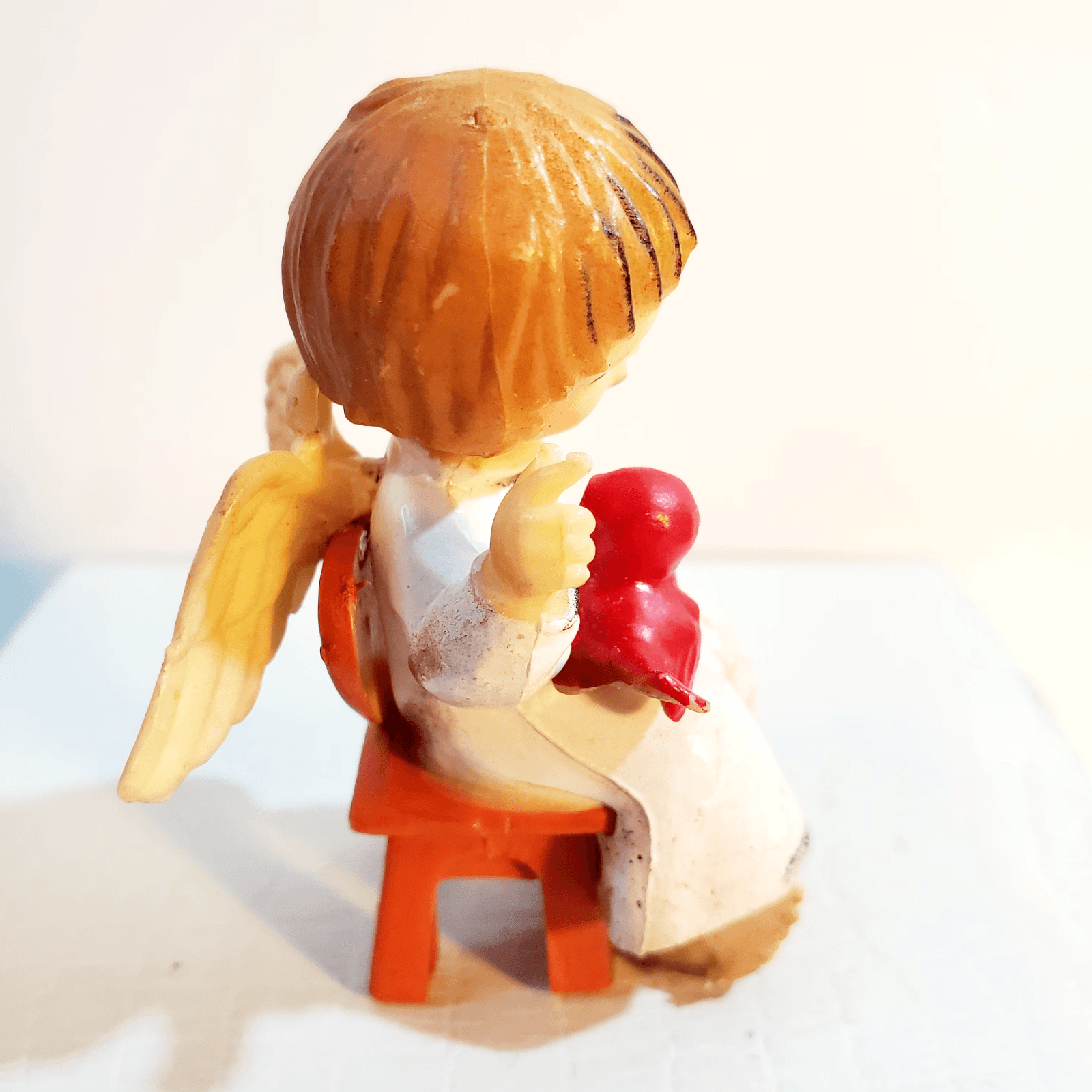 Vintage Plastic Angel Sitting and Holding Red Bird Ornament MCM 2.25" Tall - Thumbnail 3