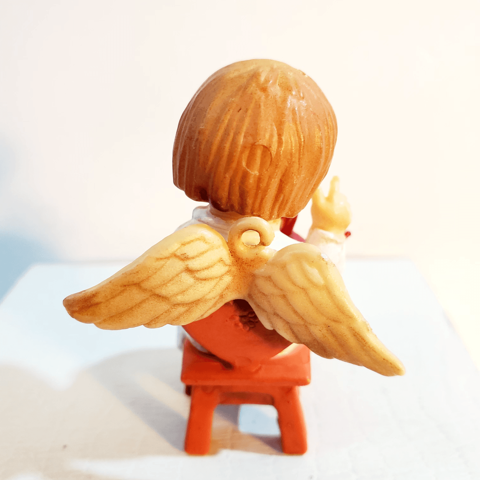 Vintage Plastic Angel Sitting and Holding Red Bird Ornament MCM 2.25" Tall - Thumbnail 2