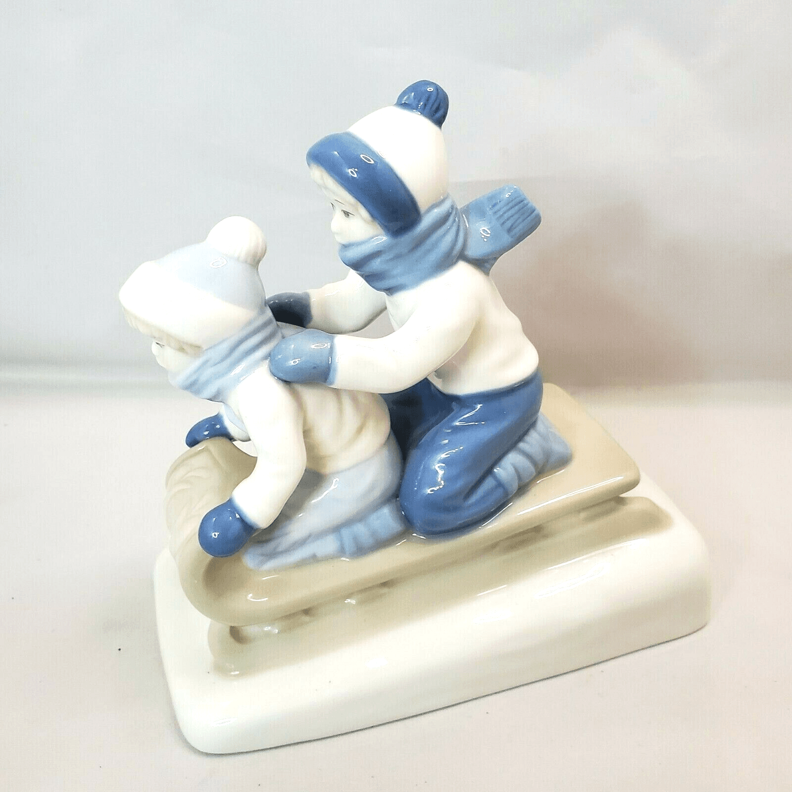 PS Porcelana De Cuernavaca Mexico Children Sledding Porcelain Figurine 1992
